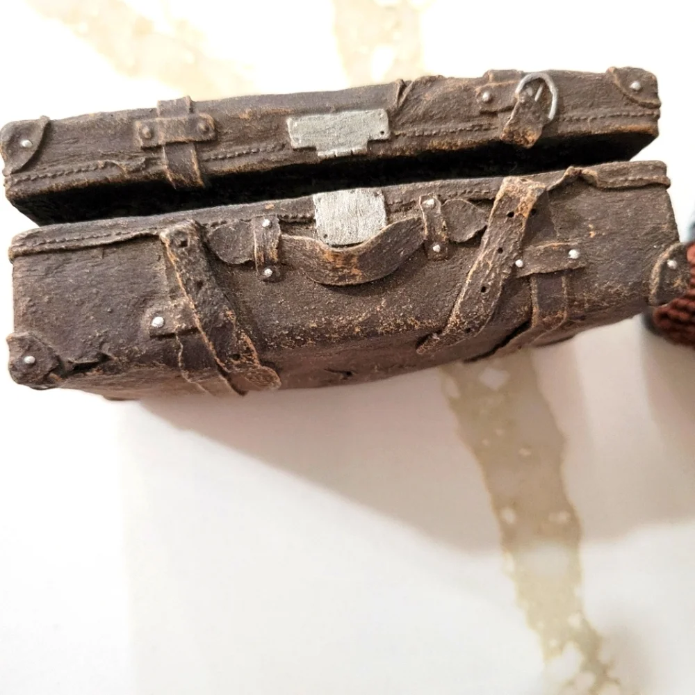 3 miniature resin suitcases